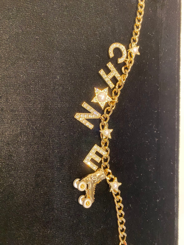 CHANEL ロゴチャームラインストーンチョーカーネックレス – co&co